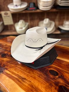 American Straw Hat 7420 S-117 4.25" JBZ Bring a touch of Americana style to your wardrobe with the American Hat Company 7420 4.25" Brim S-Minn. Made from premium quality American straw, this hat is perfect for any occasion. Its 4.25" brim provides ample shade while its S-Minn sizing ensures a comfortable fit for all. Add an iconic piece of American fashion to your collection today! You can shop all our Cowboy Hats HERE Details 4.25" JBZ Brim Trim: 2C Black 7420 S-117 Long Oval Shipping - If you’re local, you can stop in and shop at our Carthage, MO! All online orders typically ship within 1 - 2 business days after you place your order. Free shipping on qualified purchases.To be the first to see our newest arrivals, don't forget to follow us on Facebook, Instagram and Pinterest White Straw Hat For Western-themed Summer Events, White Single Vent Straw Hat For Western-themed Events, White Country Hat In Toquilla Straw, American Hat Company Straws, American Straw Cowboy Hat, Summer Straw Hat For Rodeo, One Size, Roping Dummy, Anderson Bean Boots, Denim Top Women