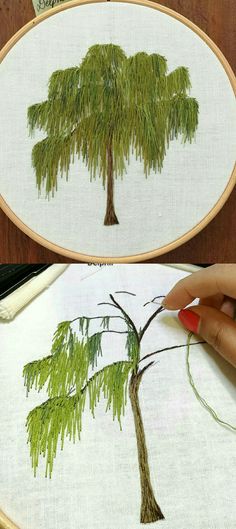 someone is working on an embroidery project with green leaves and a tree in the middle