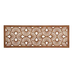 a wooden panel with an intricate design on it