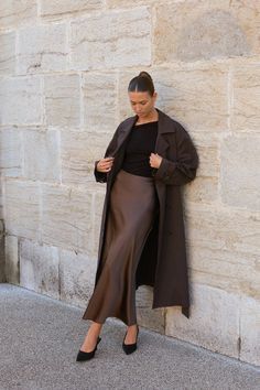 Silk Skirt Styling Ideas, Flowy Modest Outfits, Silk Skirt Ideas, Maxi Black Satin Skirt Outfit, Satin Skirt Wedding Guest, Fall Satin Skirt Outfit, Satin Skirt Outfit Formal, Silk Skirt With Sweater, Satin Skirt And Sweater