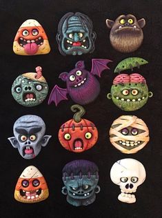 an assortment of halloween decorations on a black background, including pumpkins and heads with creepy faces