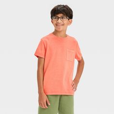 Amp up your child's casualwear style with this Short-Sleeve Washed T-Shirt from Cat & Jack™. Made from midweight cotton-blend jersey fabric, this short-sleeve T-shirt brings cool comfort to their day. Designed in a classic crewneck style with a length that hits below the hip, it features a solid hue in a washed finish, making it a fun pairing with any of their favorite pants, shorts or skirts. Cat & Jack™: Kids’ clothing with an imagination of its own. Crewneck Style, Red Tee, Kids Clothes Boys, Hem Style, Pair Of Pants, Boys Shirts, Coral Pink, Basic Tees, Casual Fits