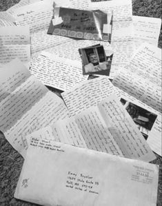 many letters and envelopes are scattered on the ground