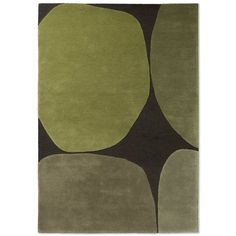 an area rug with various shapes and colors on it, including black, gray, green, and beige