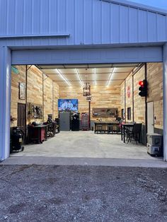 the inside of a garage with lots of furniture and accessories in it's doors