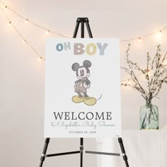 a welcome sign with a mickey mouse on it