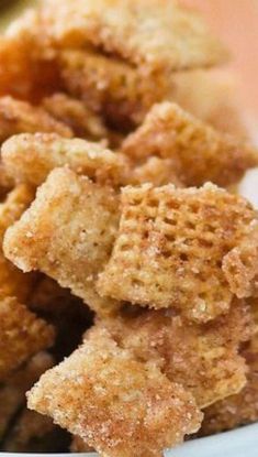 some fried food in a white bowl on a table