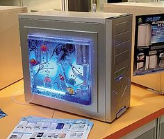 an old computer sitting on top of a desk