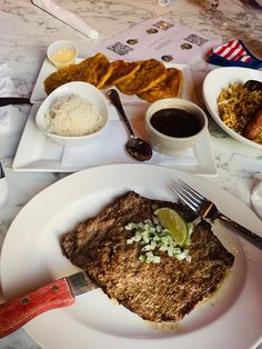 the meal is ready to be eaten on the table at the restaurant or barbeque