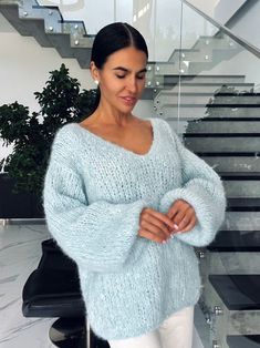 Wrap yourself in pure luxury with our exquisite chunky hand knit alpaca sweater. Crafted with love and skill, this sweater offers a perfect blend of warmth, comfort, and style. It's more than just a sweater; it's a work of art that you can wear. 🌟 Key Features: - Premium Alpaca Wool: We source the finest alpaca wool for this sweater, known for its softness, warmth, and hypoallergenic properties. It feels as luxurious as it looks. - V Neck Design: The deep V-neck adds a touch of sophistication t Chunky Hand Knit, Alpaca Sweater, Knit Alpaca, Oversized Pullover, Loose Sweater, Sweater Making, Alpaca Wool, Cool Sweaters, Balloon Sleeves