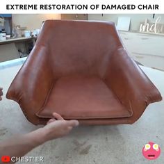 a person is holding up a brown leather chair with the words extreme restoration of damaged chair