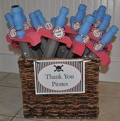 a basket filled with lots of blue and red toothbrushes