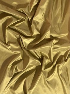 an image of a plain gold fabric