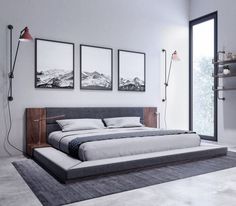 a bedroom with three pictures hanging on the wall