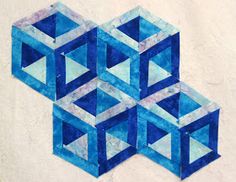 an abstract painting of three blue cubes on a white background, each with one smaller square in the middle