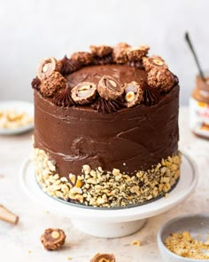 a chocolate cake sitting on top of a white plate