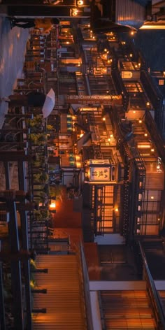 an overhead view of many buildings lit up at night