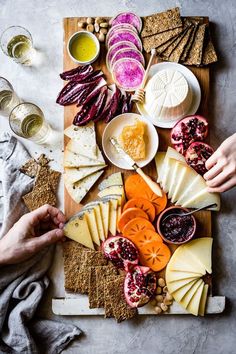 the instagram page is filled with different types of cheeses and other food items