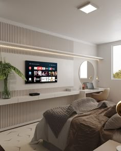 a bedroom with a large flat screen tv mounted on the wall next to a bed