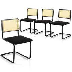 three black chairs with yellow mesh backrests and one has a black seat cushion