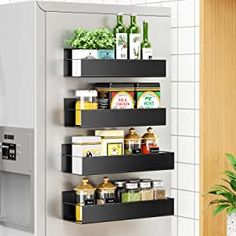 an image of a kitchen shelf with spices and food items on the shelves in it