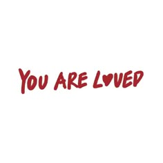 the words you are loved written in red ink