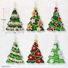 christmas tree ornaments are shown in different colors and sizes, including red, green, white, and pink