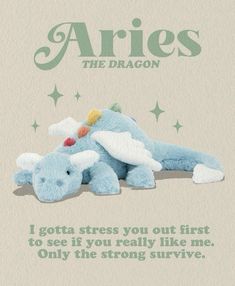 a blue stuffed animal laying on top of it's side with the caption aries the dragon