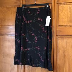 Nwt Vintage Notations Woman Vintage Black Skirt With Pink And Coral All Over Subtle Floral Print With Gorgeous Lace Detail Inlets At The Ruffle Bottom. Size 2x. 26 Inches Long. Waist 18.5 Inches Across Laying Flat. 95% Nylon 5% Spandex. Brand New No Flaws From A Smoke Free Home. Price Is Firm. Gorgeous Spring Or Summer Skirt! Plus Size Alternative Fashion, Black Floral Skirt, Boho Lifestyle, College Fits, Future Wardrobe, Church Decor, Summer Skirts, Black Skirt, Alternative Fashion