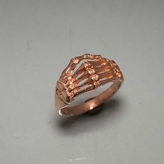 This is a 14k rose gold version of the silver skeleton hand ring, solid 14k rose gold size 8, and can easily be sized. Skeleton Hand Ring, Skeleton Jewelry, Gold Skeleton, Hand Ring, Skeleton Hand, Skeleton Hands, Salt Lake City, Lake City, Rings Statement