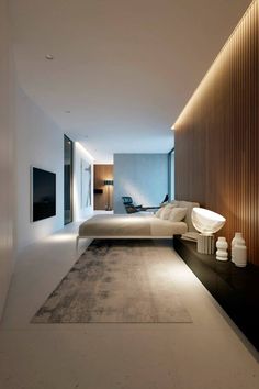 an image of a modern bedroom with white walls and carpeted flooring in arabic