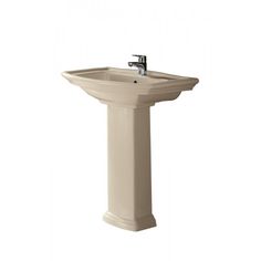 a white pedestal sink on a white background