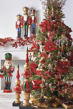 a christmas tree decorated with red and gold ornaments