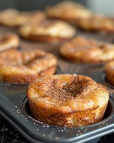 several baked goods are sitting in a muffin tin