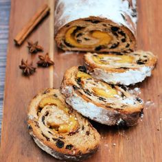 cinnamon roll with raisins and anise on a cutting board