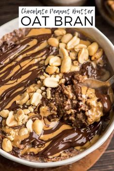 chocolate peanut butter oatmeal in a bowl with a spoon full of nuts