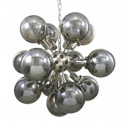 a chandelier made out of chrome balls