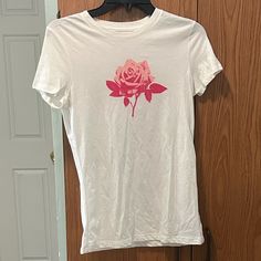 Aeropostale Classic Crew Women’s Size Medium Short Sleeve White Tight Fitting Tee Shirt With Rose Design. In Great Condition!! Never Worn!! No Rips, Holes, Markings, Or Stains! Open To Offers!! Please Feel Free To Contact Me If You Have Any Questions About This Shirt, Thank You! Casual Rose Print Tops In Rose Color, Casual Rose Print Tops, White Cotton Tops With Rose Print, White Cotton Top With Rose Print, Casual Rose Cotton Top, White Cotton Rose Print Top, Casual Pink T-shirt With Rose Print, Casual Pink Rose Print T-shirt, White Tee Shirt