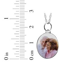 Make your memories last with this personalized small oval photo necklace. Crafted in 10K white gold A photo of your choice appears on the front of the charm and your message is engraved on the back The oval charm measures 16.88 x 22.75mm The 18-inch rope chain secures with a spring ring clasp Please follow these steps: 1) Place your order; 2) Text your photo from your smartphone to (330) 435-8997; and 3) When prompted, please respond with your Order Confirmation #. Standard text messaging rates may apply. Text Messaging, Order Confirmation, Photo Charms, Photo Necklace, 1 Place, Personal Photo, Text You, Rope Chain, Your Photo