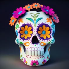 a colorful skull with flowers on its head