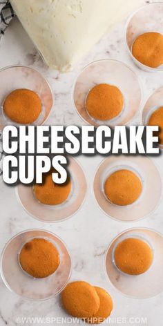 cheesecake cups are lined up on the counter and ready to be eaten with text overlay