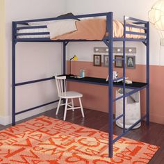 a bunk bed with desk underneath it in a room that has pink walls and hardwood floors