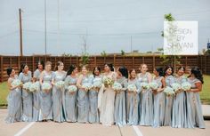 a group of women standing next to each other