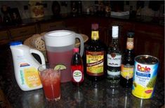 various alcohols and condiments on a kitchen counter