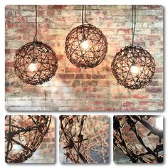 three hanging lights made out of branches on a brick wall