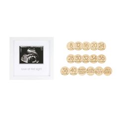 a baby announcement with gold coins and an image of a baby's birth date