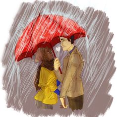 two people standing under an umbrella in the rain