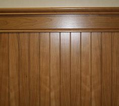 a close up of a wooden door with no glass on the top and bottom panel