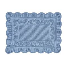 a blue placemat with an intricate design on the edge and border in the shape of a rectangle