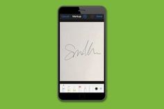 a cell phone with the word smile on it's screen and an image of someone writing